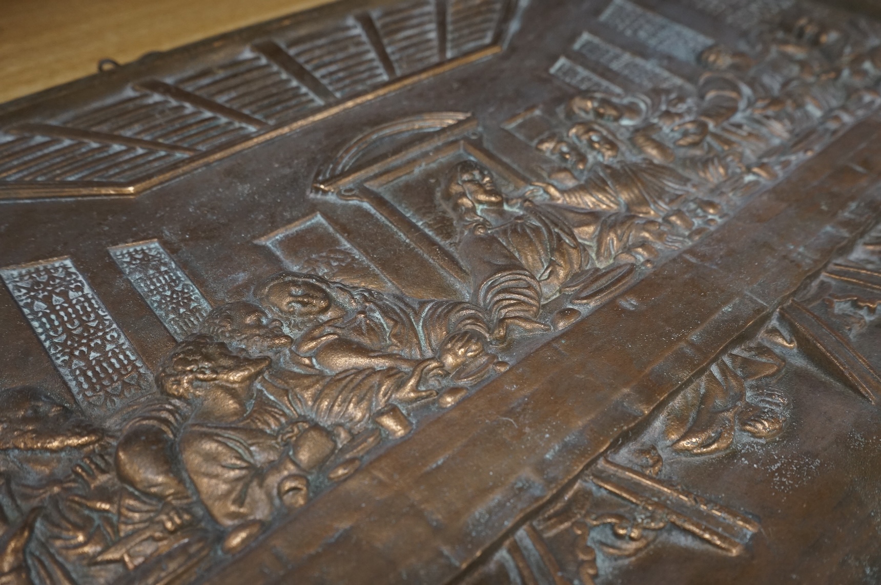 A bronze plaque of ‘The Last Supper’, 65cm x 35cm